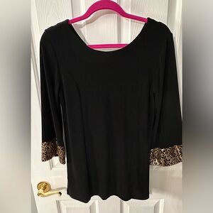 Chico’s Travelers Elegant Black Top with gold sequin decoration.